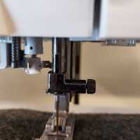 Rändelschraube für Nadelhalter expression, performance, creative